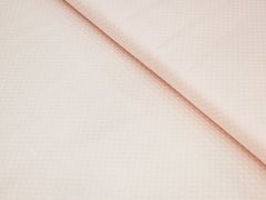 LIGHT PEACH DOTTED TEXTURED PLAIN PREMIUM MIX COTTON SHIRT FABRIC.